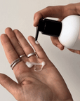 Gif showing someone pour Mini Styling Cream - Alcôve Hair in their palm