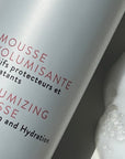 Close-up image of Volumizing Mousse Bottle by Alcôve Hair 200 ml