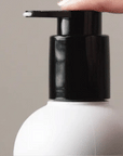 Gif of someone pumping Alcove Hair Styling Cream 250 ml showing texture
