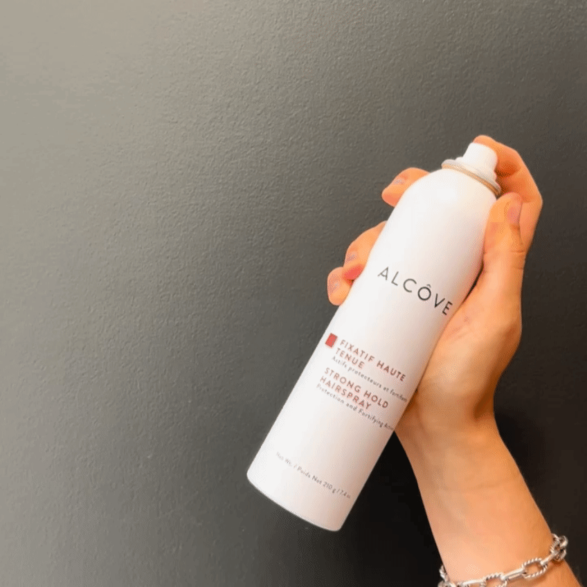 Gif showing a handing spraying the Alcove Hair Strong Hold Hairspray