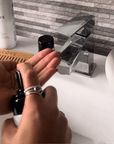 Gif showing pour the Alcôve Hair Volumizing Mousse in their palm