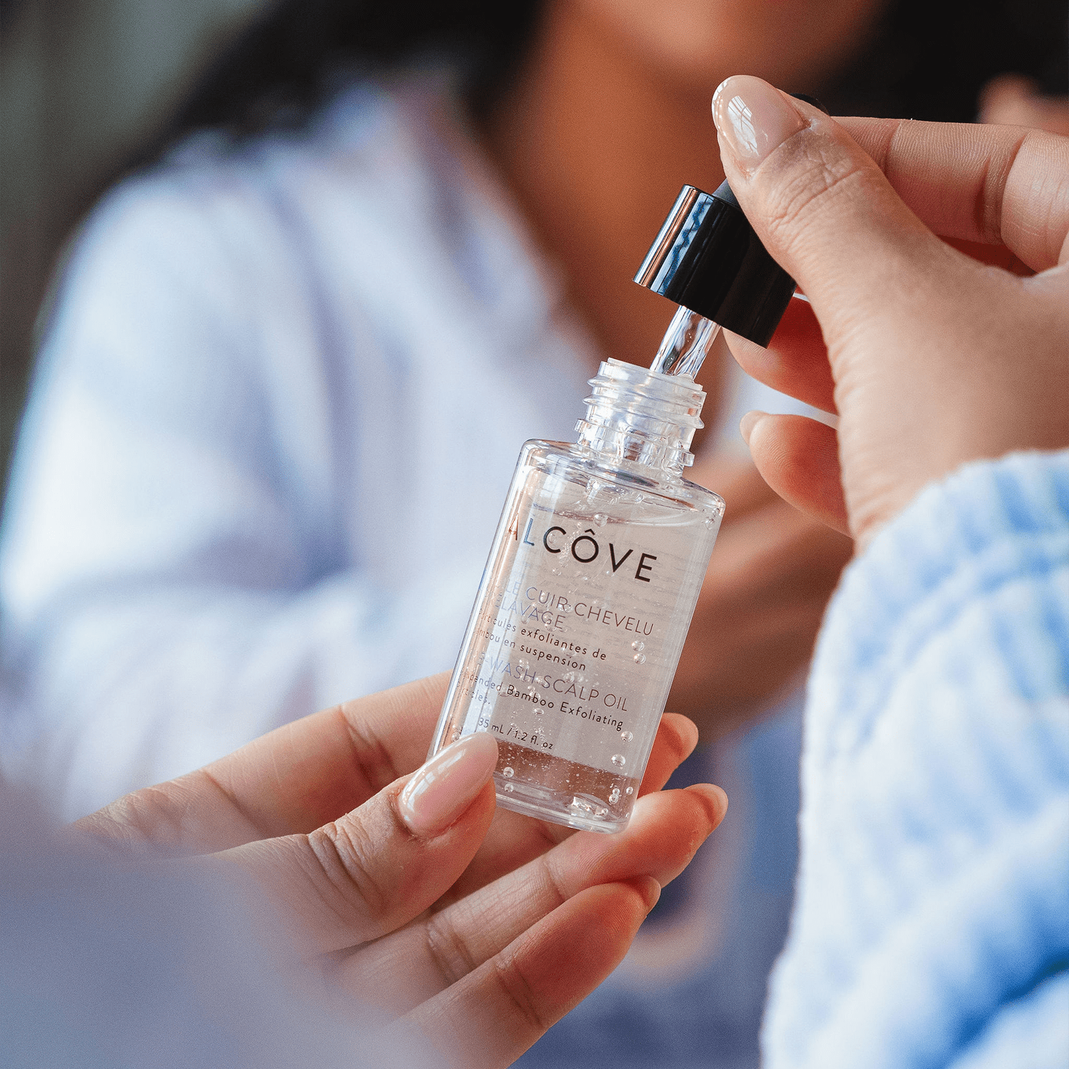 Bottle of Alcove Hair Pre-Wash Scalp Oil showing its content