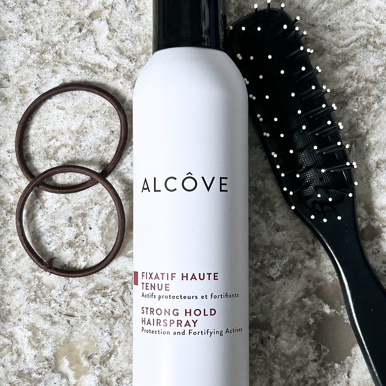 Bottle of Alcove Hair Strong Hold Hairspray
